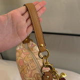 Cutest mini pink coach bag in very good condition