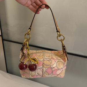 Cutest mini pink coach bag in very good condition