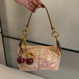 Cutest mini pink coach bag in very good condition