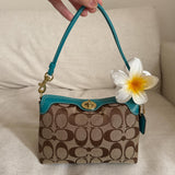 Cutest authentic vintage mini turnlock coach bag in excellent condition