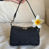 Cutest mini turn-lock coach bag in very good