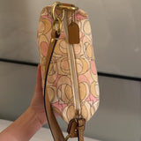 Cutest mini pink coach bag in very good condition