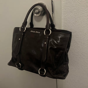 PreOwned dreamy Miu Miu leather bag